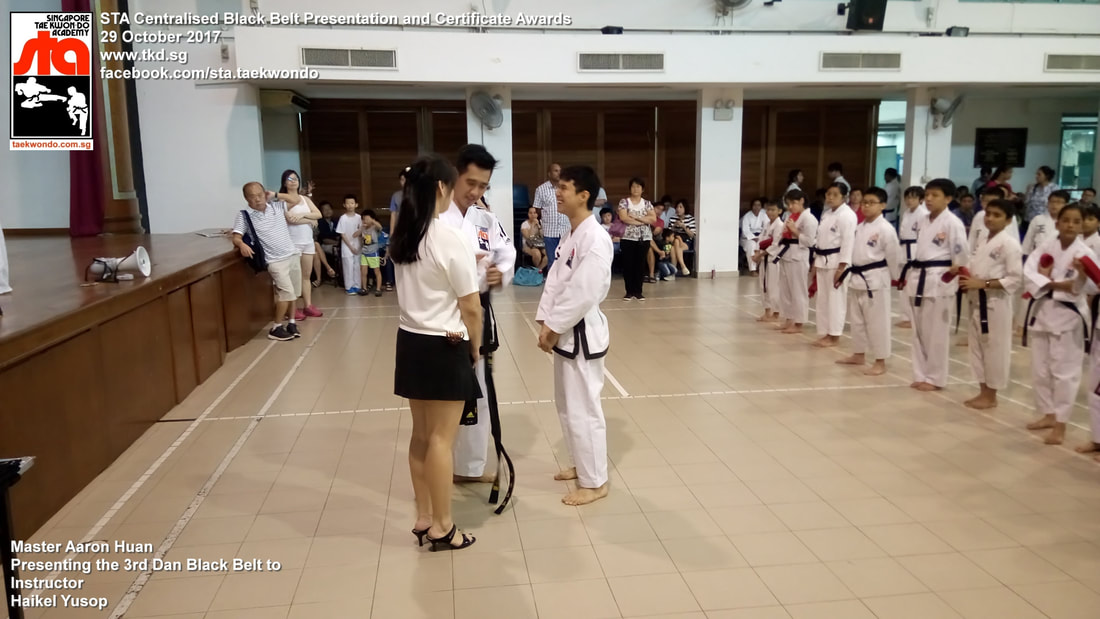 Haikel Yusop Senior Instructor Promoted 3rd 4th Dan Black Belt Presentation STA Centralised Grading Singapore Taekwon-do Academy HQ Taekwondo