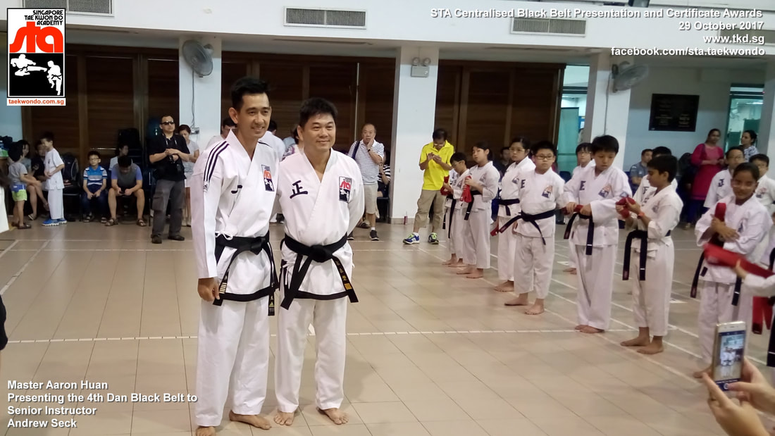 Andrew Seck Senior Instructor Promoted 3rd 4th Dan Black Belt Presentation STA Centralised Grading Singapore Taekwon-do Academy HQ Taekwondo